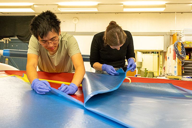 The 2025 ANU Solar Racing team manufacturing solar cells for their car. Photo: supplied