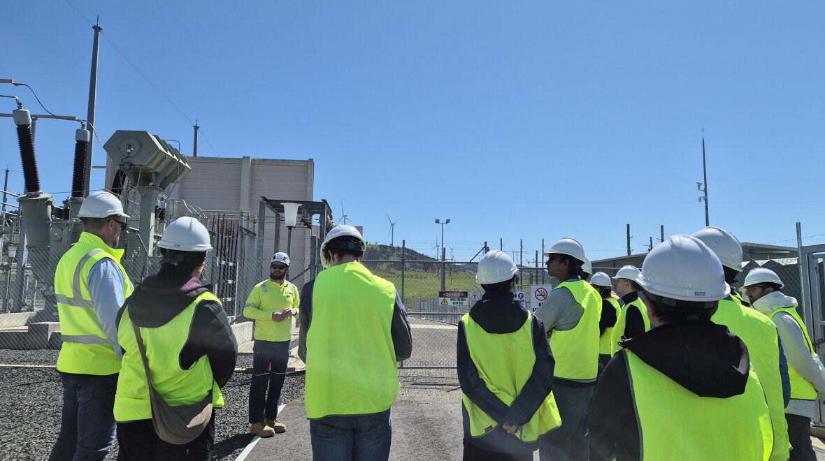 Staff and students listening to grid engineers (photo credit: Weiting Sun and Nara Choi)