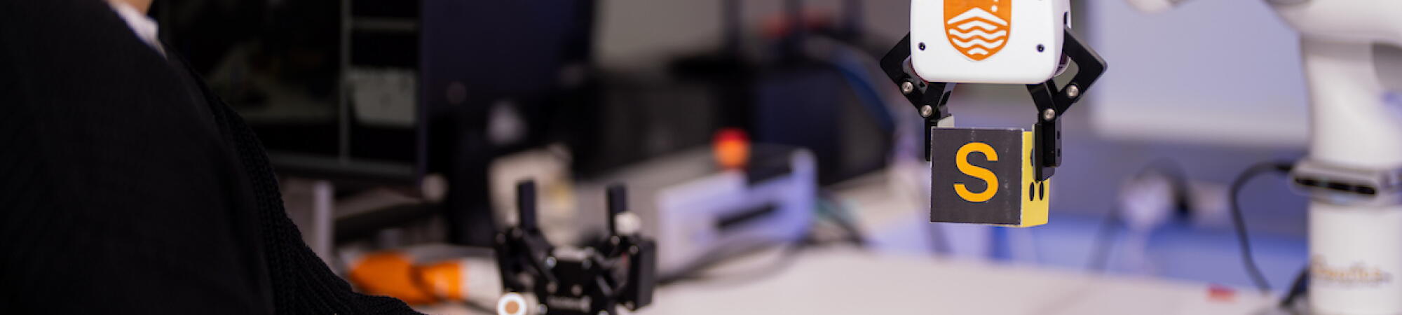 ANU student in the robotics lab